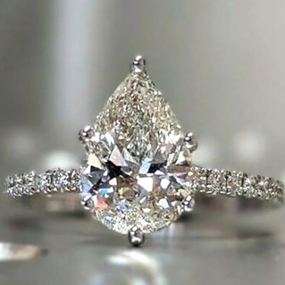 Pear shaped solitaire ring